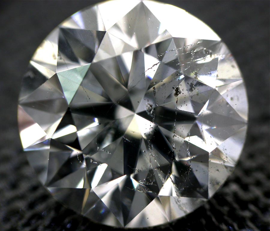 Dodgy diamonds to be avoided. This diamond shows just how bad the inclusions can look and the detrimental affect this will have on the sparkle of the diamond.