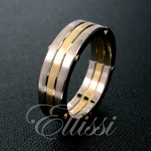 "Triune" Two tone wedding ring with three bands.