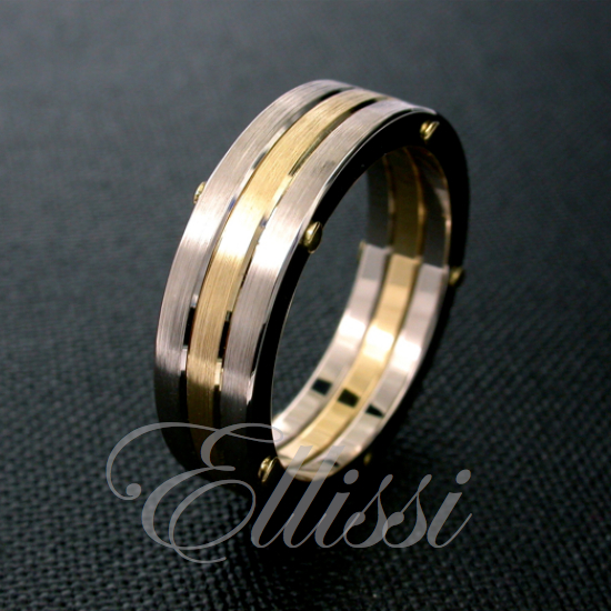 “Triune” Two tone wedding ring with three bands.