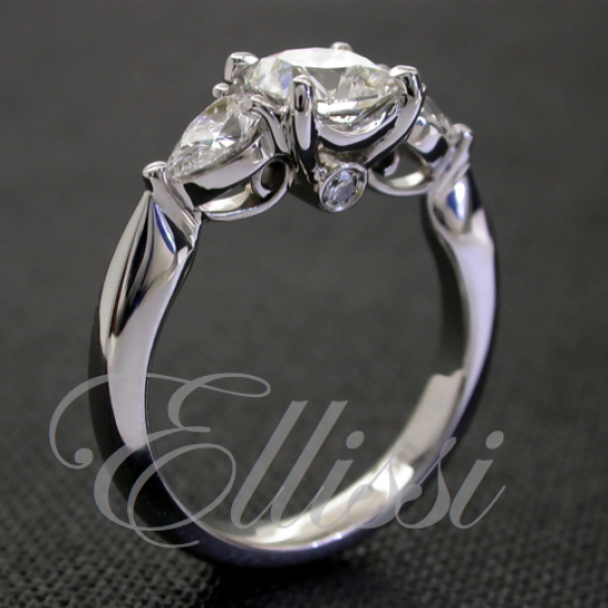 "Myrtle" side view of cushion and pear cut ring.