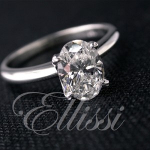 "Felicity" Oval cut four claw solitaire.