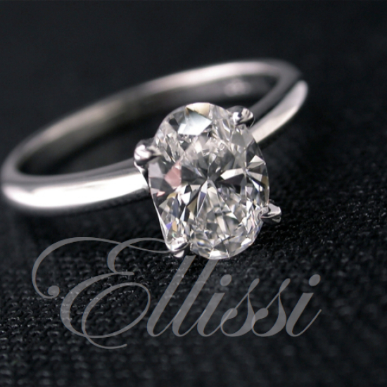 “Felicity” Oval cut four claw solitaire.
