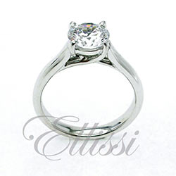 “Fleur” A classic four claw set round brilliant cut diamond