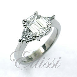 “Astor” Emerald and Trilliant cut diamond ring.
