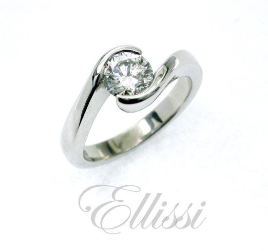 “Leo” Curved band solitaire diamond ring.