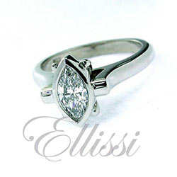 "Marchese" bezel set Marquise diamond ring.