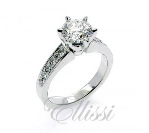 "Crystal" six claw Round Brilliant cut diamond ring.