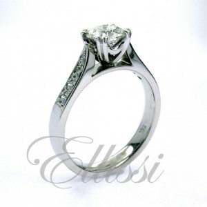 "Cherri" spear shoulder design solitaire ring.