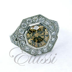 “Piani” Cognac diamond halo cluster ring.
