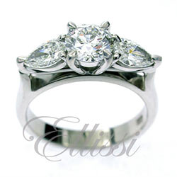 "Rose" Pear and Round Brilliant cut trilogy ring.