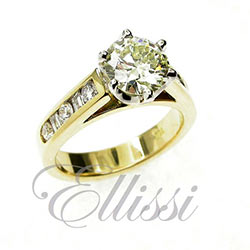 "Amber" light yellow round briliant cut diamond ring.