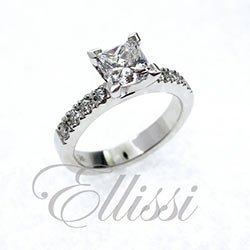 “Enduring” Princess cut ring with shoulder diamonds.