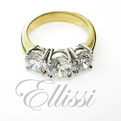 “Gem” Stunning yellow and white gold trilogy ring.