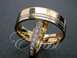 "Dovetail" 18ct. yellow and white gold wedding bands