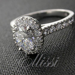 "Dora" Oval cut diamond halo ring.