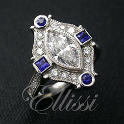 “Stella” Intricate Marquise diamond halo ring.