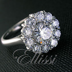 “Floretta” Round brilliant cut diamond cluster ring.