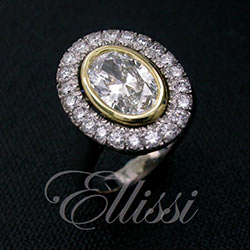 "Lauressa" Oval Brilliant cut halo cluster ring.