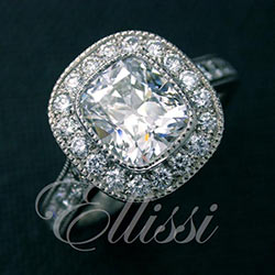 “Sara” Bezel set cushion cut diamond halo ring.