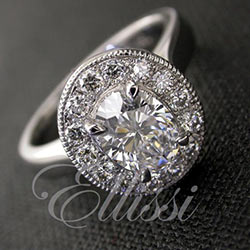 "Claudia" Oval diamond halo ring.