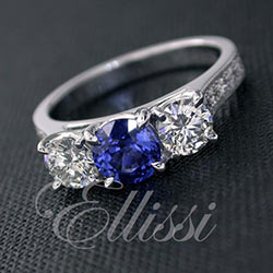 “Delta” sapphire and diamond three stone ring.