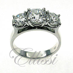“Gisel” show-stopper Round brilliant cut trilogy ring.