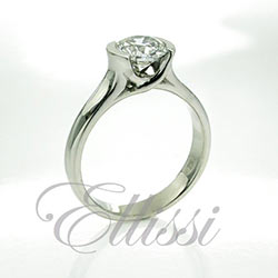 "Erin" Round brilliant cut solitaire, semi bezel set.