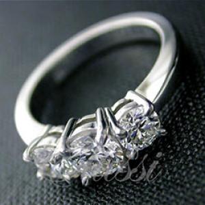 “Gemma” Three-stone brilliant cut diamond ring.