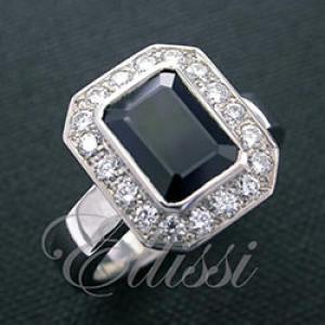 “Kastra” Australian sapphire in diamond halo.