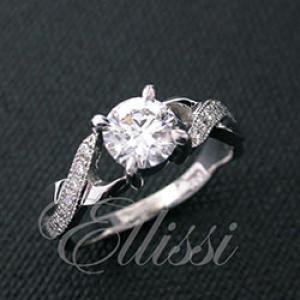 “Mercia” Round brilliant cut diamond twist ring design.