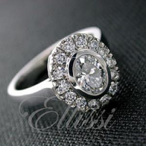 “Maricela” Bezel set Oval cut diamond cluster ring.