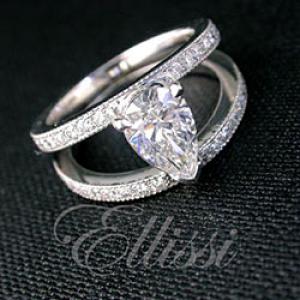 "Vesta" Pear shaped diamond in a split band setting.