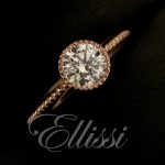 This is a rose gold solitaire set with a round brilliant cut diamond