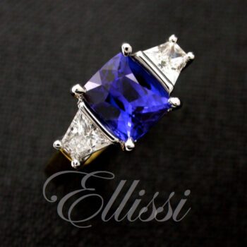 Cushion cut ceylon sapphire and Trapezoid diamond engagement ring