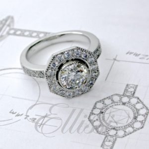 Halo cluster diamond ring sitting on top of its ring design