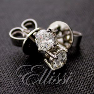 Diamond stud earrings. Half a carat each, one carat in total