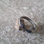 Unusual engagement ring hand carved from a meteorite