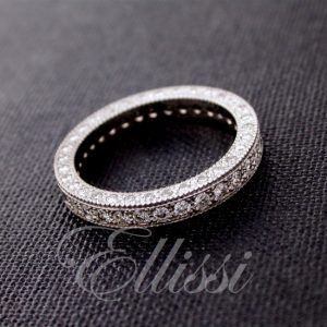 Wedding band fully set with diamonds on two sides
