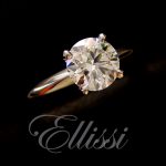 1 carat diamond, round brilliant cut, set in a four claw 18ct. white gold ring