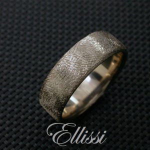 Male wedding ring with feature roughened surface