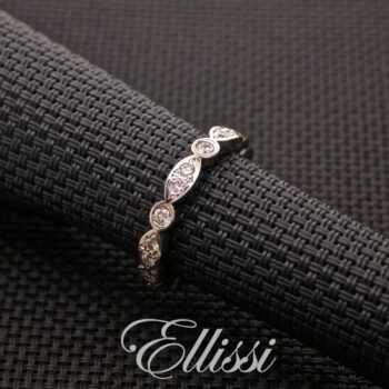 Unique bezel set wedding band