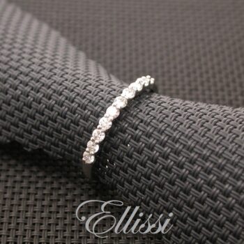 Set with 10 x 0.03ct. round brilliant cut diamonds