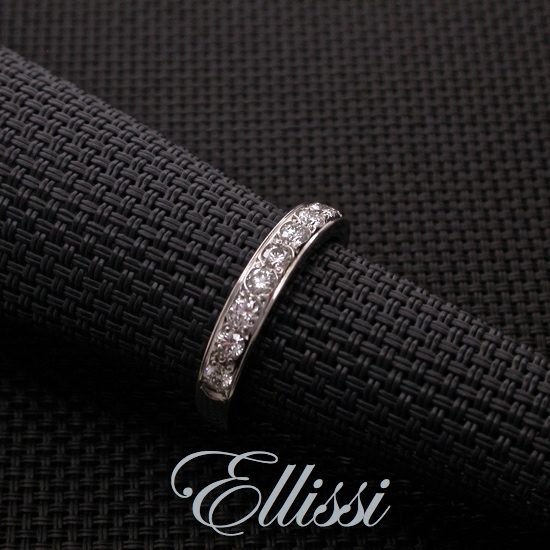 Polished edge wedding band with just under half a carat of diamonds