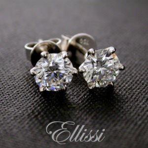Diamond stud earrings, just under half a carat of diamond each