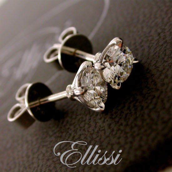 Stud earrings each set with half a carat diamond