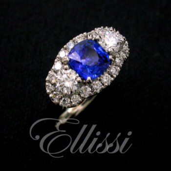 Cushion cut sapphire engagement ring.