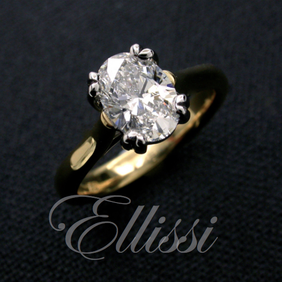 Oval Solitaire Diamond Ring Set in 18ct. Yellow and White Gold