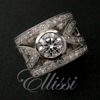 Wide diamond band set with round brilliant cut diamond